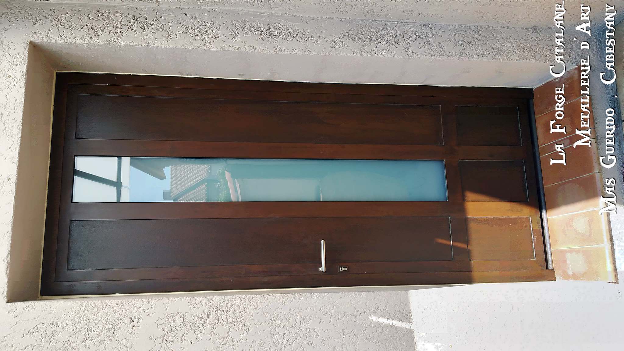 porte entree en fer imitation bois forge catalane.jpg